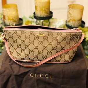 Authentic Gucci GG Canvas shoulder bag.